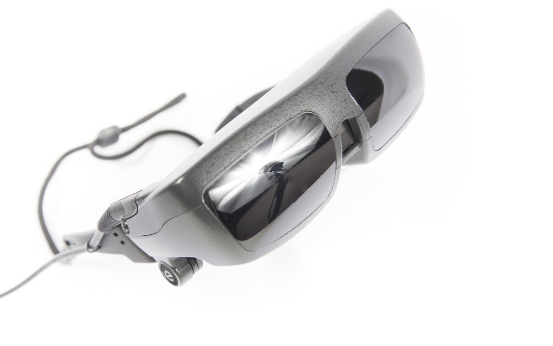 eSight eyewear for people with low vision incorporates New Scale’s M3-F focus module with a high-resolution video camera and two displays. (photo courtesy eSight Corp.)